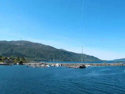 a group of boats docked in a body of water at Apartment Huglavika by Interhome in Nordhuglo