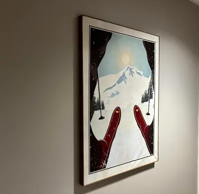 a picture of skis on the snow on a wall at Stryn House Hotel in Stryn
