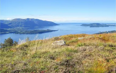 a view of a large body of water from a hill at 1 Bedroom Lovely Apartment In Svortevik in Svortevik