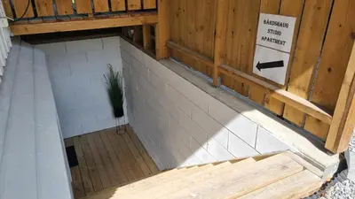 an overhead view of a building with a potted plant at Bårdshaug Studio Apartment in Orkanger