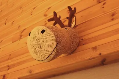 a stuffed animal is hanging on a wall at Linnaeus - 6 person cabin in Ål