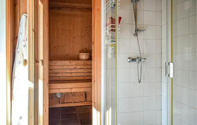 a bathroom with a shower and a toilet and a shower at Cozy Home In Hemsedal With Kitchen in Hemsedal