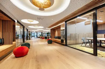 an office lobby with red and green spheres on the floor at Hotel Alexandra Loen in Loen