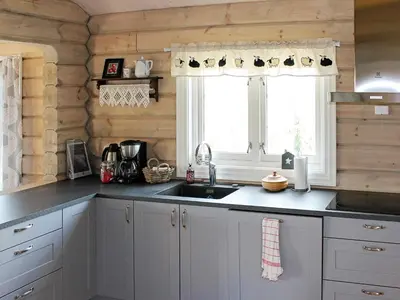 a kitchen with a sink and a window at 6 person holiday home in Svingvoll in Svingvoll