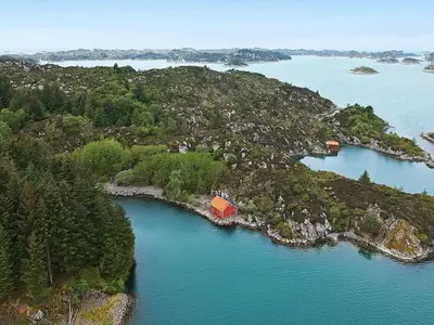an aerial view of an island in a body of water at 6 person holiday home in Urangsvåg in Steinsbø