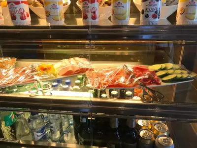 a display case in a store filled with food at Eidfjord Hytter in Eidfjord