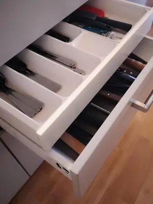 a drawer filled with lots of wine bottles at Trollveggen Camping in Åndalsnes