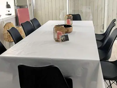 a white table with two cages on top of it at 10 person holiday home in Brattvåg in Brattvåg