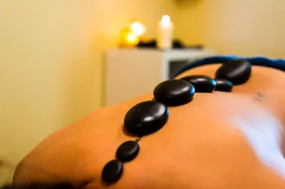 a person wearing a necklace of black beads at Savalen Fjellhotell & Spa in Tynset