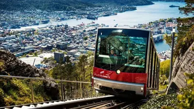 a trolly tram on a mountain overlooking a city at Nedre Stølen Apartment Bergen in Bergen