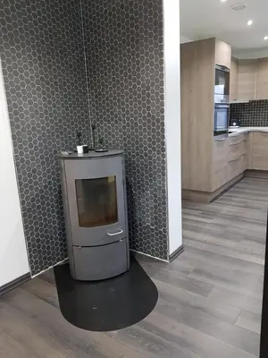 a kitchen with a small television in a room at Lagunen Apartments in Bergen