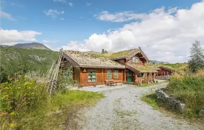 a log cabin with a grass roof at 4 Bedroom Stunning Home In Hemsedal in Hemsedal