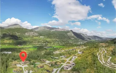 a red marker in front of a valley with mountains at 4 Bedroom Stunning Home In Hemsedal in Hemsedal