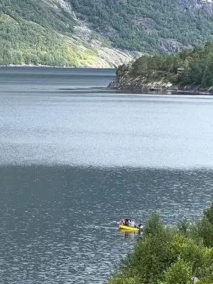 a boat in the middle of a body of water at Iris Vedal in Nauste