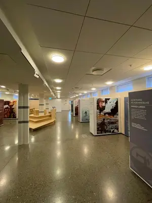 an empty room with a museum with exhibits in it at Falstadsenteret - Museum, minnested og senter for menneskerettigheter in Levanger