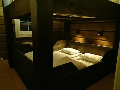 a couple of bunk beds in a room at STORHAUGEN GARD in Lom
