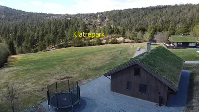 an overhead view of a building with a grass roof at Hytte i Stryn med elbil lader in Stryn