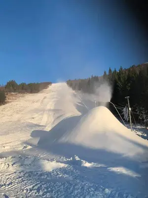 a pile of snow on a snow covered road at Hytte i Stryn med elbil lader in Stryn