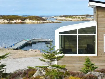 a house with a view of a body of water at 6 person holiday home in Dyrvik in Dyrvik
