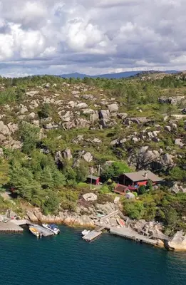 an aerial view of a shoreline with boats in the water at Ferienhaus „Draumen“ in Norwegen in Bømlo