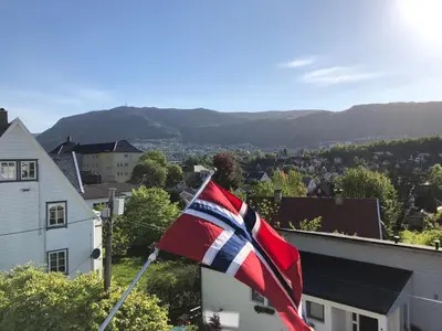 a british flag flying on top of a house at # 1 Mountain View with free street parking in Bergen