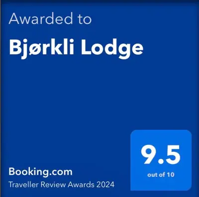 a screenshot of a cell phone with the text awarded to blkiki lodge at Bjørkli Lodge in Geilo