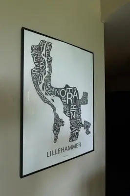 a framed picture of a map of nigeria on a wall at Lys og moderne leilighet rett ved skiløypa på Nordseter - Kort vei til Sjusjøen, Lillehammer og Hafjell - Dyr ikke tillatt in Nordseter