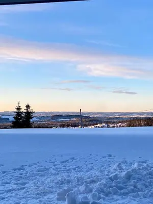 a view of a frozen lake in the snow at Lys og moderne leilighet rett ved skiløypa på Nordseter - Kort vei til Sjusjøen, Lillehammer og Hafjell - Dyr ikke tillatt in Nordseter