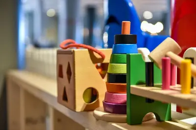 a group of wooden toys sitting on a counter at Scandic Ørnen in Bergen