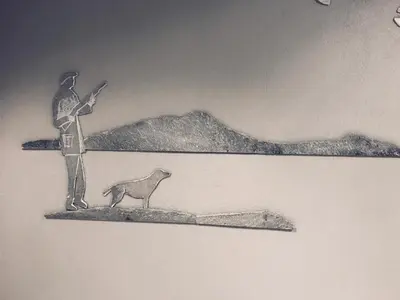 a drawing of a man and a dog on a mountain at Oppdal Gjestetun Hotell in Oppdal