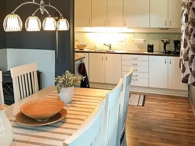 a kitchen with a table with a bowl on it at 6 person holiday home in AVERØY in Stein
