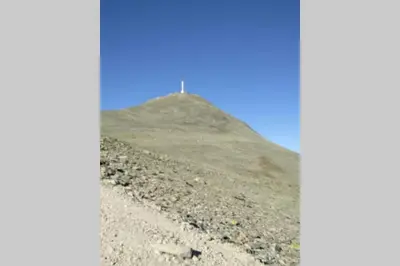 a hill with a cross on top of it at Apartment Gaustablikk in Gaustablikk