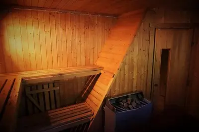 an inside view of a sauna with a staircase at Hjartdal Fjellstoge & Storhytte in Hjartdal