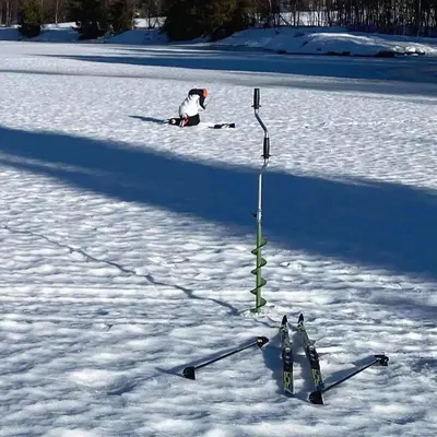 a reflection of a skier in the snow at In the middle of Trysil fjellet - Welcome Center - Apartment with 4 bedrooms and sauna - By bike arena and ski lift in Trysil