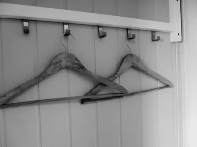 a pair of hangers hanging on a wall at Hamar Vandrerhjem in Hamar