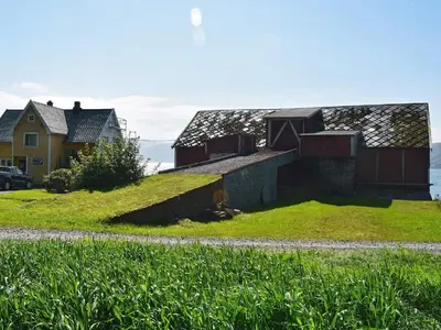 a house on top of a hill with grass at 6 person holiday home in FISKÅ-By Traum in Fiskå