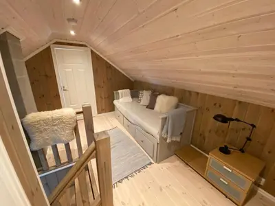 a small room with a couch in a tiny house at Endely - ski inn / ut in Rauland
