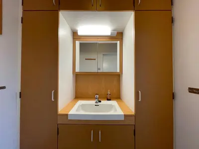 a bathroom with a sink and a mirror at BORG Sommerhotell in Ålesund
