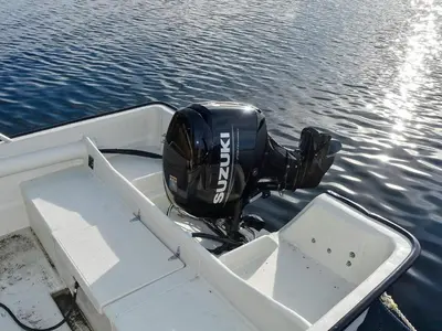 a motor on the back of a boat in the water at 6 person holiday home in Bud-By Traum in Bud