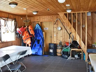 a room with a room with a tent and a staircase at 6 person holiday home in Bud-By Traum in Bud