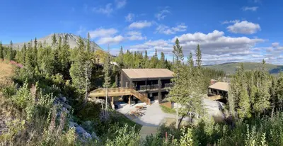 an aerial view of a house in the mountains at Gausta View in Gaustablikk