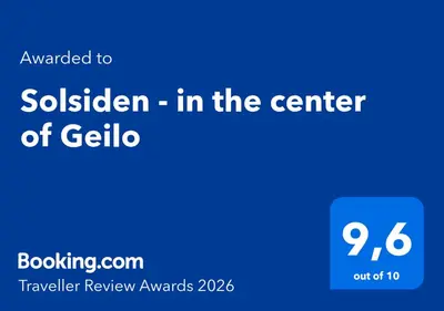 a blue sign with the text swollen in the center at Solsiden - in the center of Geilo in Geilo