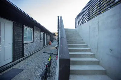 a stairway with two bikes parked next to a building at Panorama 17 - fantastisk utsikt! in Sogndal