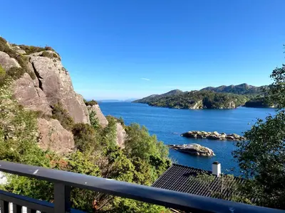 a view of a body of water with rocks at Bergen/Sotra: Sea cabin. Spa. Fishing. Boat in Haganes