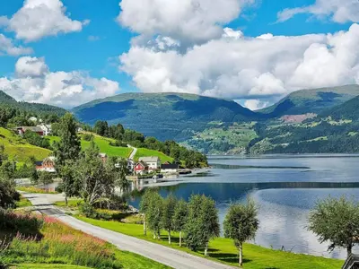 a view of a lake with mountains in the background at 4 person holiday home in Utvik-By Traum in Utvik