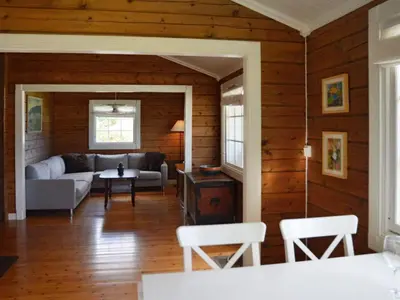 a living room with a couch and a table at 4 person holiday home in Utvik-By Traum in Utvik