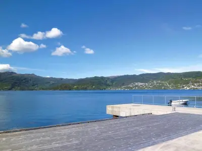 a dock with a view of a large body of water at 6 person holiday home in TYSSE-By Traum in Tysse