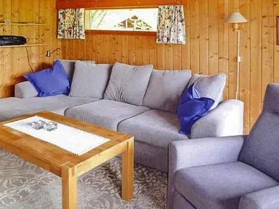 a living room with a couch and a coffee table at 6 person holiday home in olden-By Traum in Olden