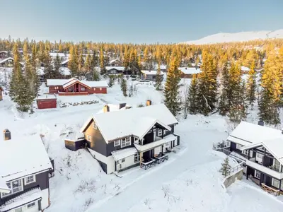 an aerial view of a home in the snow at Nice apartment with Sauna and ski in out Trysil in Trysil
