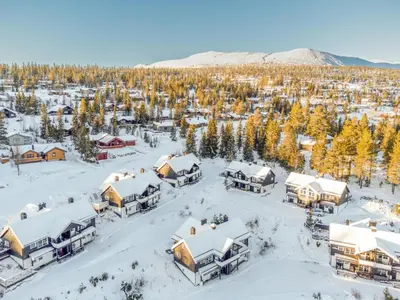 an aerial view of a village in the snow at Nice apartment with Sauna and ski in out Trysil in Trysil